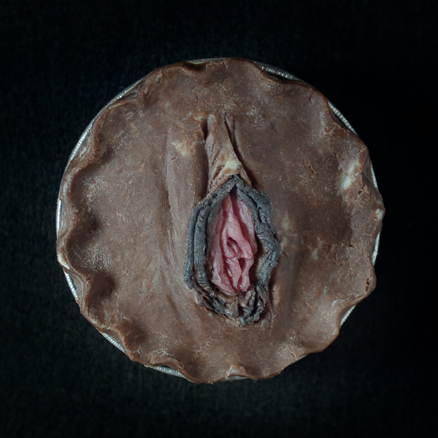 Pie 28, a pie sculpted to look like a realistic vulva
