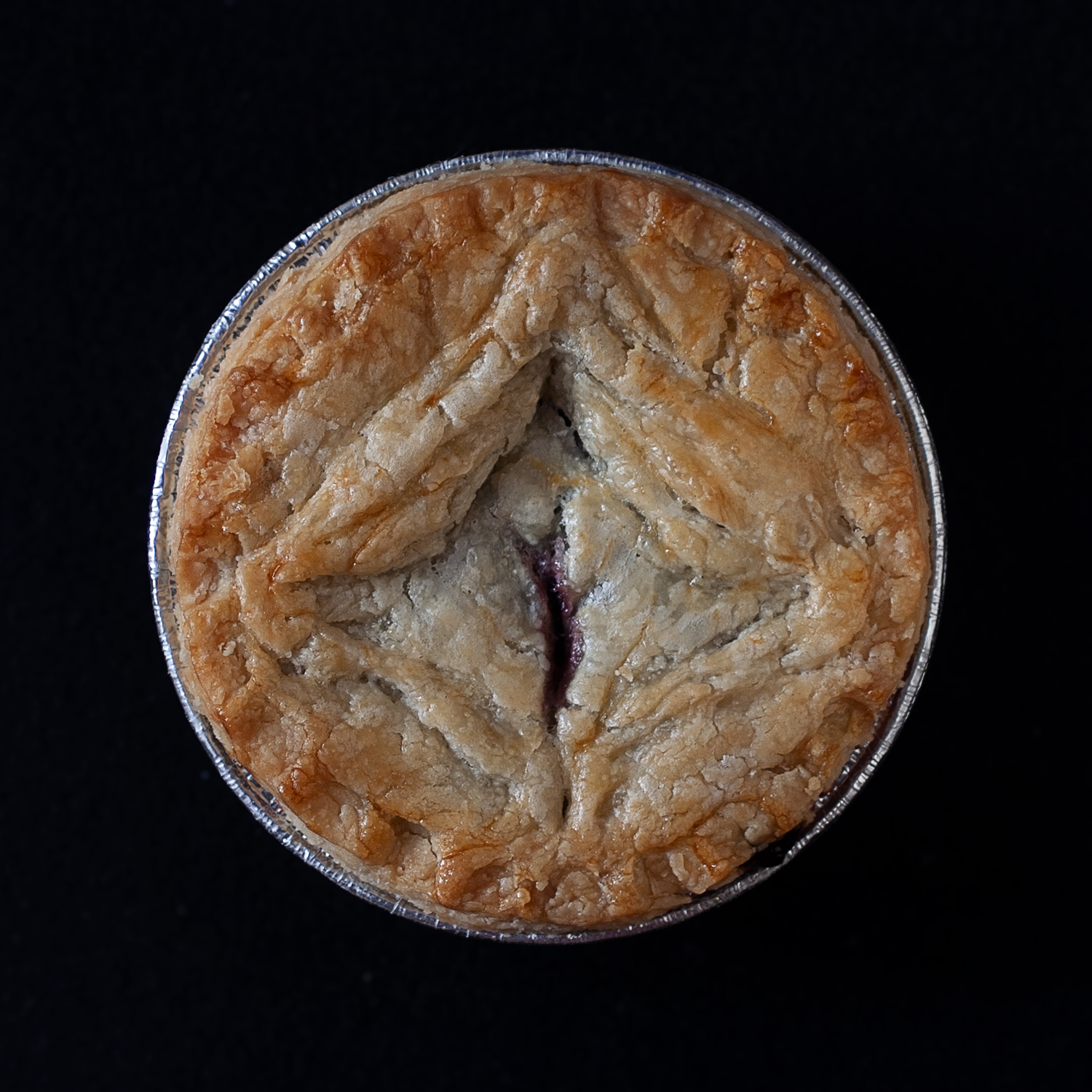 Top view of baked vulva pie number 9