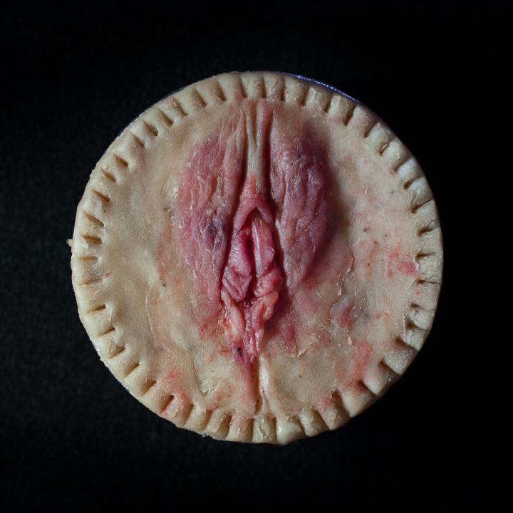 Peach vulva pie with realistic coloring made with freeze-dried strawberries