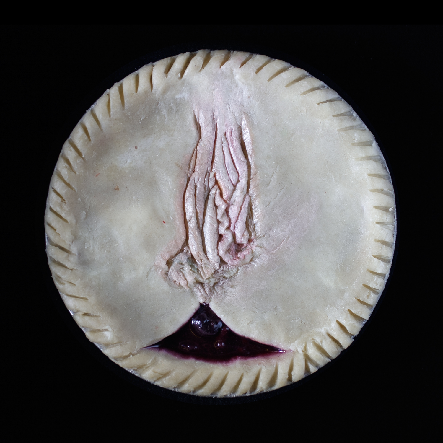 Pie art made to look like a human vulva